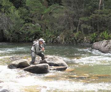 Angler fly fishing the Meander River